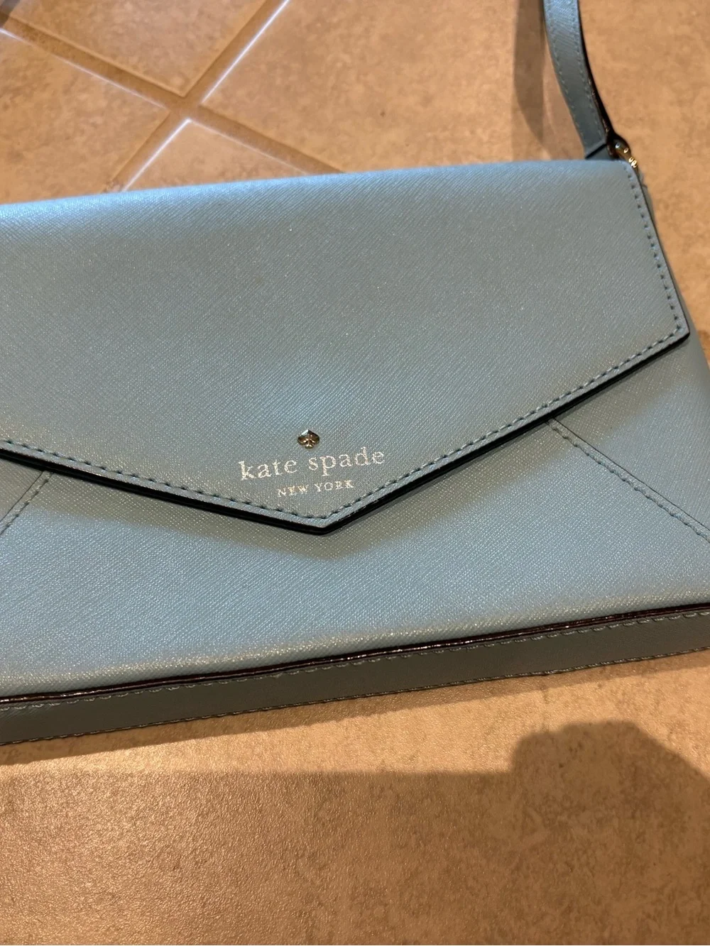 Kate Spade NY Cedar Street Monday envelope style leather crossbody bag blue